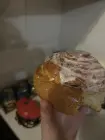 Жалоба-отзыв: Выпечка булочка с изюмом - Булочка с волосами.  Фото №1